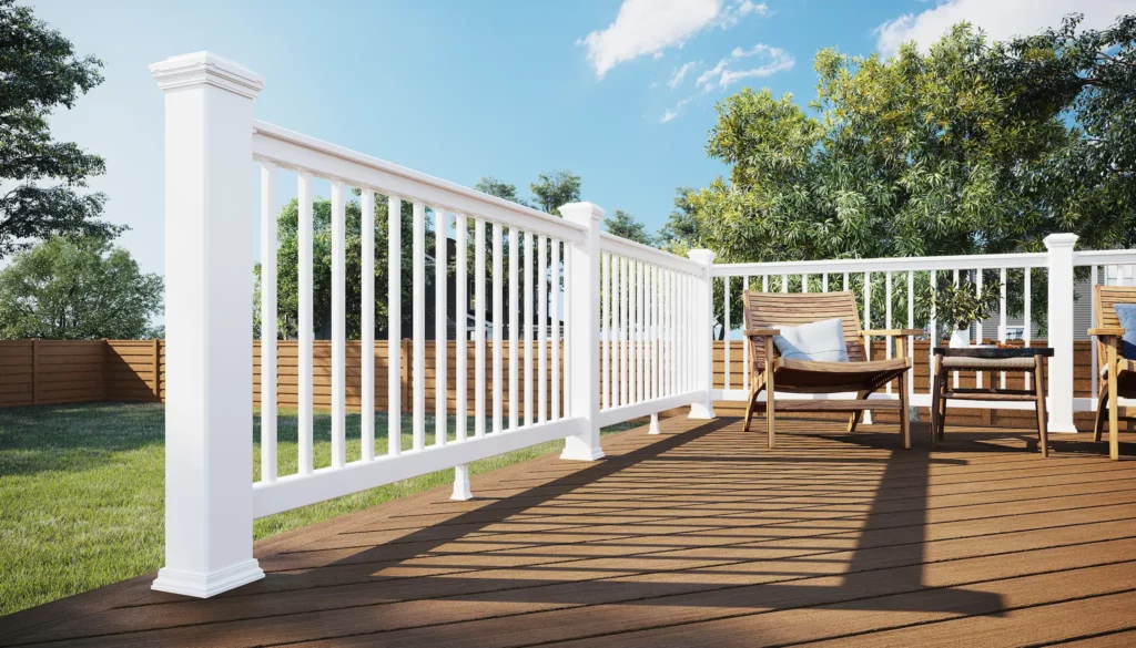 Photo of a brown Trex deck with white railing.