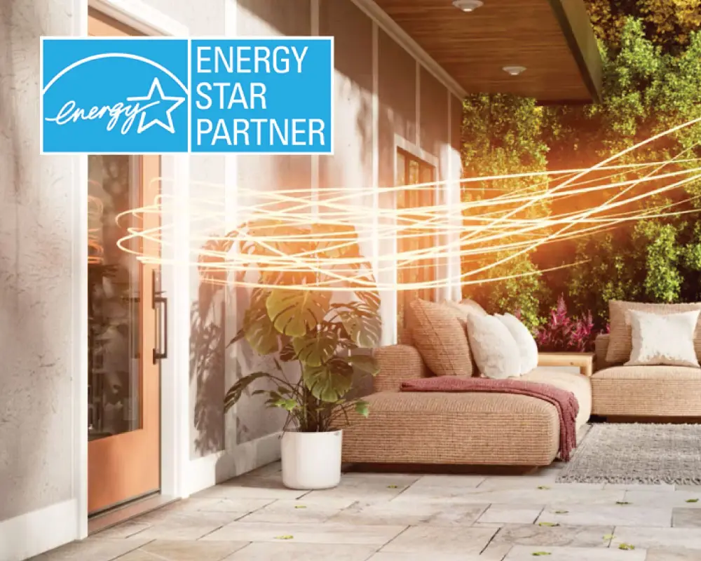 Photo of a home and patio from outside with light streaks leading up to the door and turning away representing the efficiency of ThermaTru Doors, an Energy Star Partner.